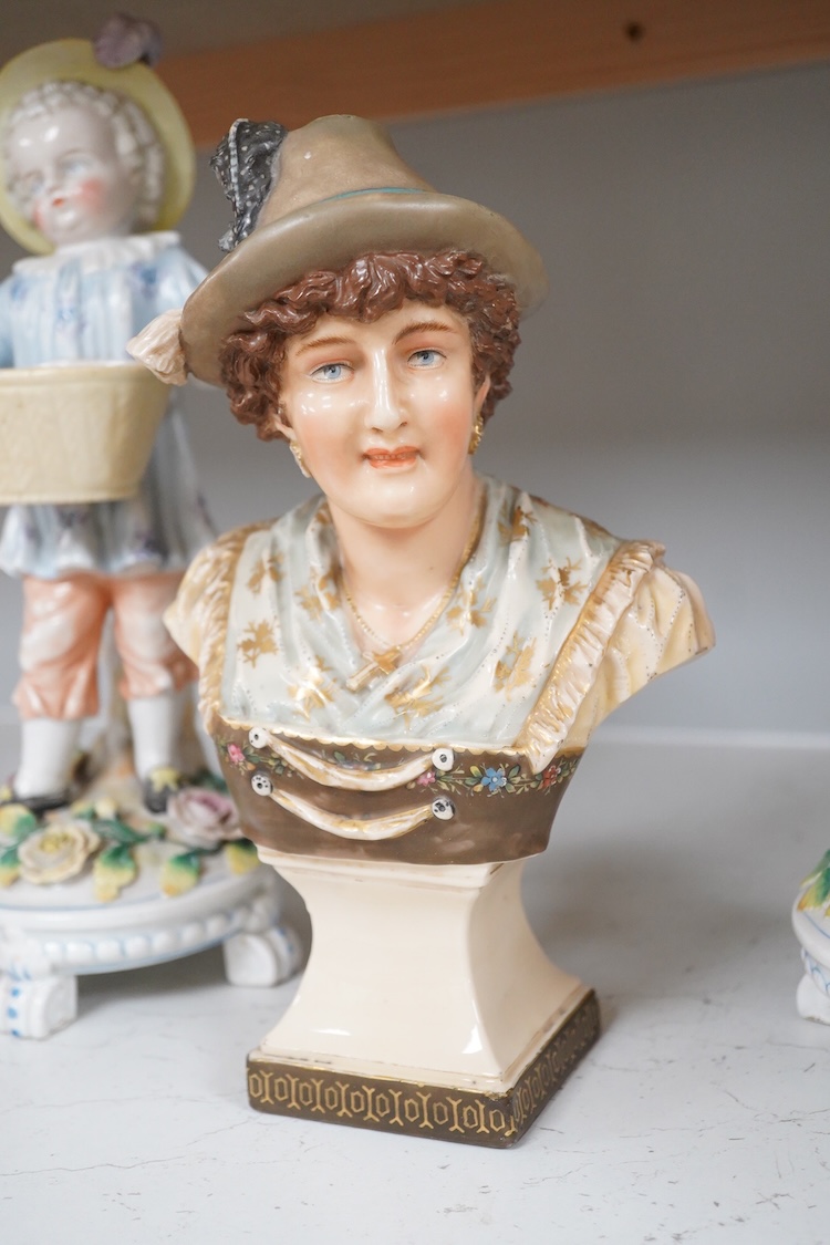 A pair of Volkstedt figures, 30cm high and a Royal Dux portrait bust